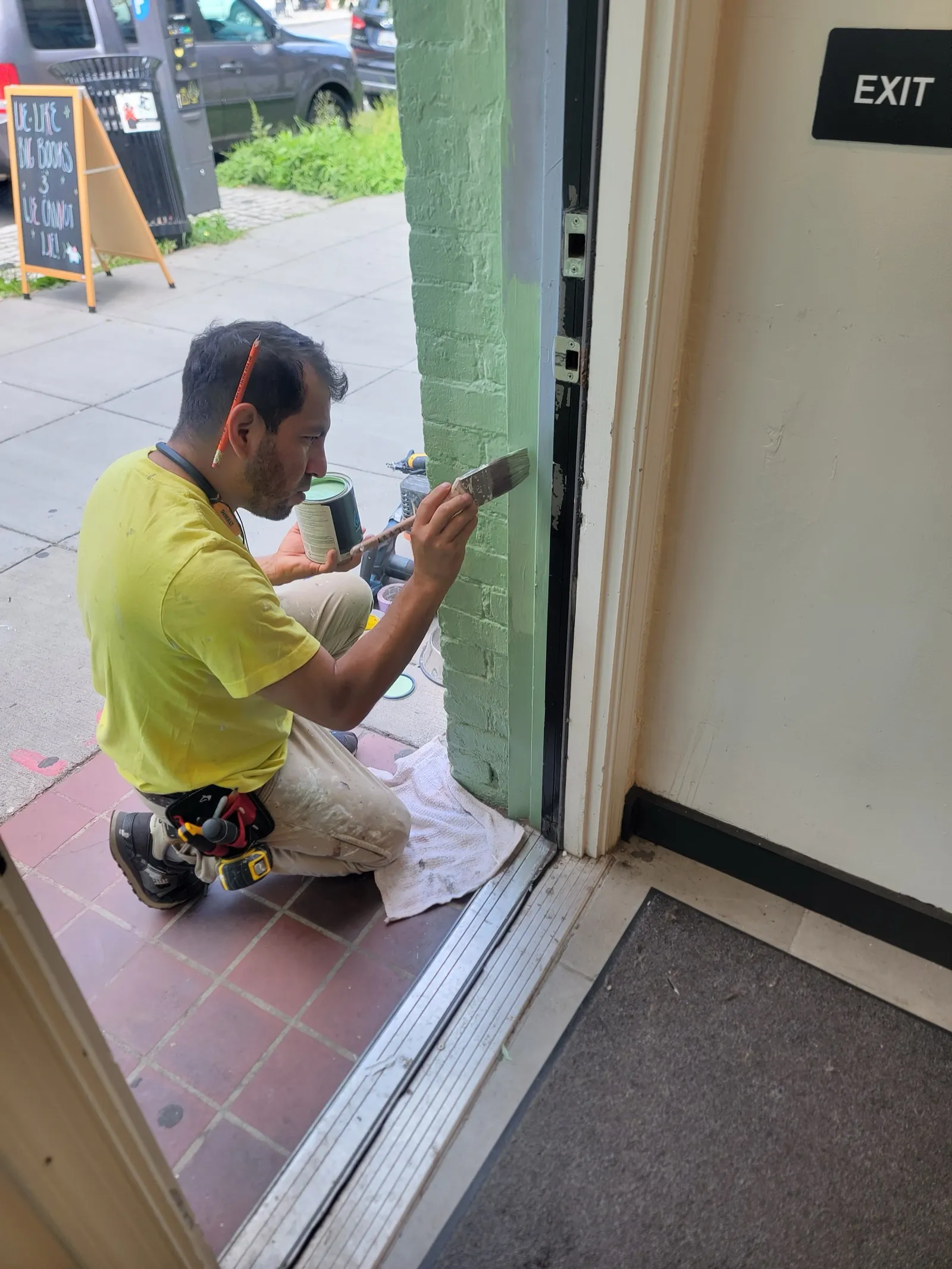 Commercial exit door prepped and painted