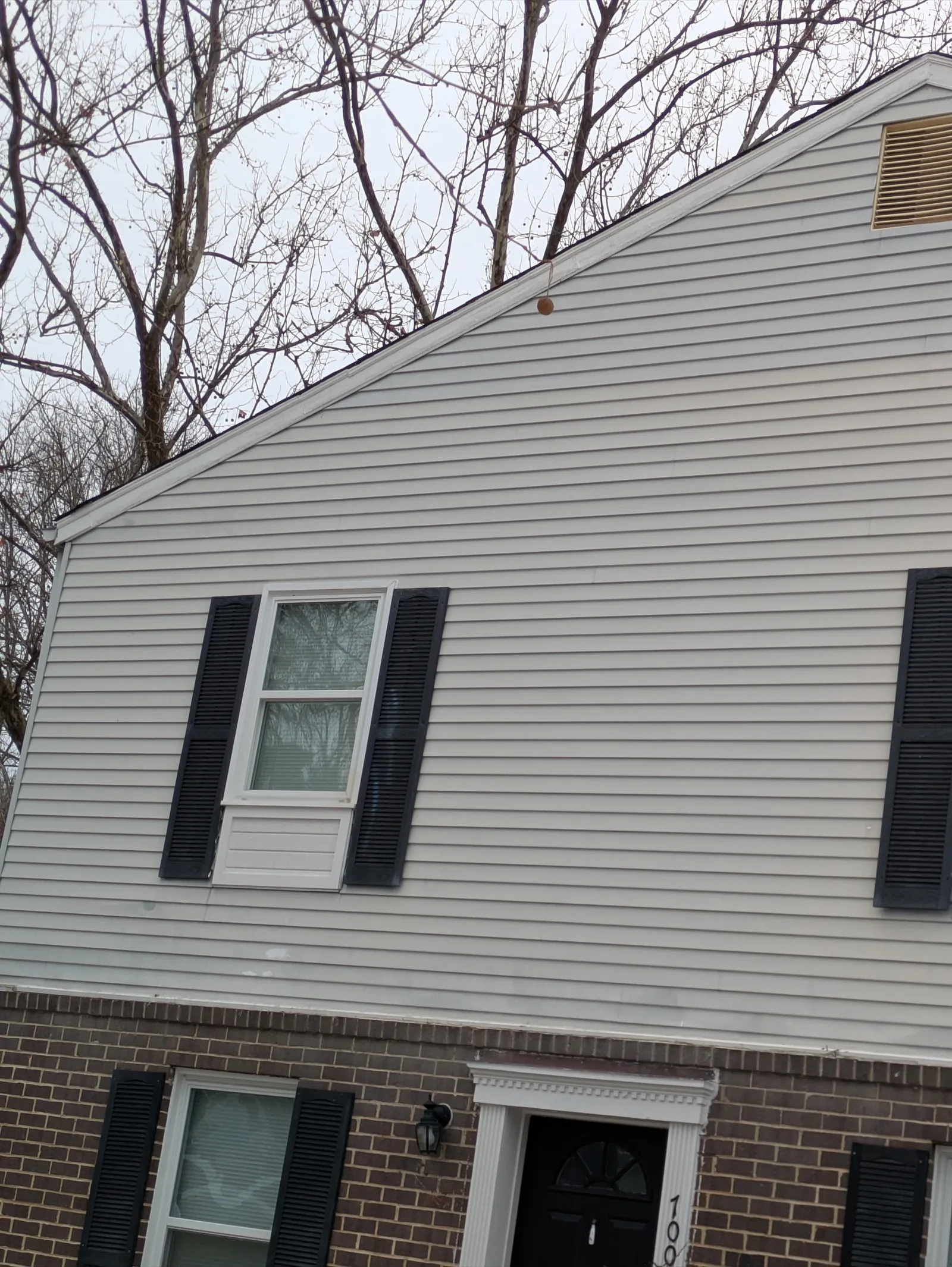 Home exterior with repaired siding in Odenton MD